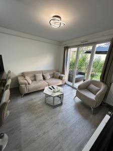 Appartements Petit appartement, cosy tres calme a cote de PARIS : photos des chambres