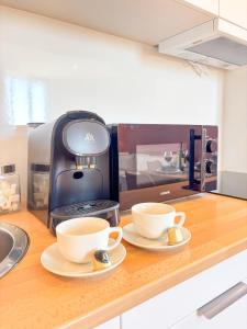 Appartements L-Etoile - Parking Gratuit, Confort & Design Chic : photos des chambres