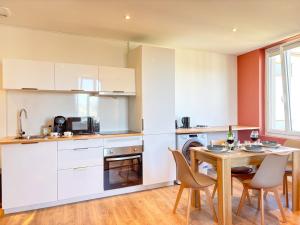 Appartements L-Etoile - Parking Gratuit, Confort & Design Chic : photos des chambres