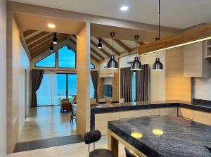 Rainy House By Serenity Sea House