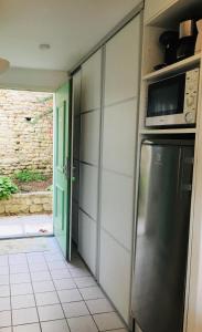 Appartements Grand studio jardin et piscine Coeur St-Martin : photos des chambres