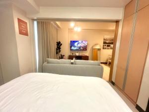 Cozy 1BR at Greenbelt Hamilton Makati