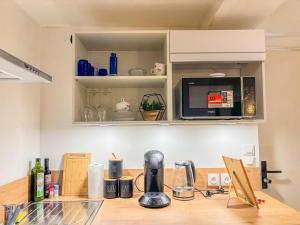 Appartements Joli T2 avec wifi et Netflix proche du golf : photos des chambres