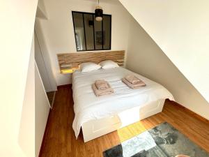 Maisons de vacances Maison en Triplex proche centre-ville : photos des chambres
