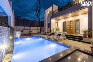 Nakeshatra Villa by VEO - Part of StayVista with Pool, Lawn, Balcony at city center in Udaipur
