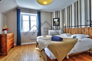 Maisons de vacances LocaLise - M6A - Ty Heol - Maison de vacances a quelques pas du port et des plages - jardin avec terrasse entierement clos - wifi inclus : photos des chambres