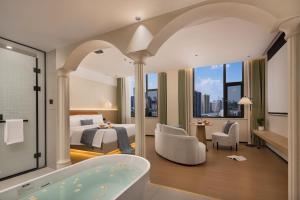 Lijiang Bamboo Elegance Court Hotel - 3hvězdičkové hotely ve městě Li-ťiang