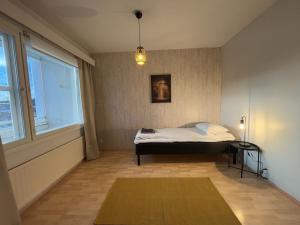 Kotimaailma-huoneisto huippupaikalla