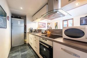 Appartements Appartement chaleureux a Annecy, 63 m², cheminee : photos des chambres