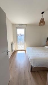 Appartements Le 72 contemporain - les Arenes : photos des chambres