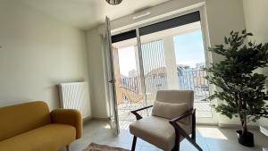 Appartements Le 72 contemporain - les Arenes : photos des chambres
