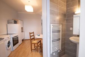 Appartements grand studio IJ 35m² IJ centre IJ 4pers/2lits IJ cuisine IJ wifi : photos des chambres
