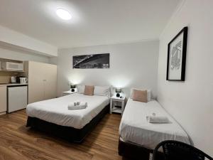 city staycation studio with 2 beds