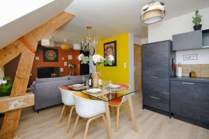 Appartements La Perle Ducale : photos des chambres