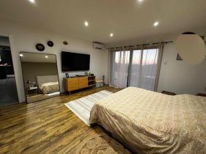 Villas Magnifique Villa avec piscine et jacuzzi : photos des chambres