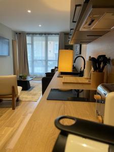 Appartements COSY TERRASSE 6 pers Ax Thermes Centre Parking : photos des chambres
