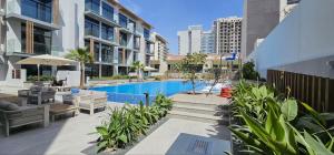 Luxury Stay JVC Modern 1BHK Pool & Gym Access