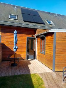 Maisons de vacances Maison avec terrasses a 300m de la mer Juno Beach : photos des chambres