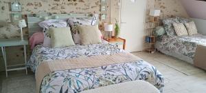 Maisons d'hotes Le Clos Fleuri : photos des chambres