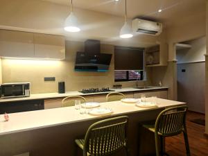 Gulzar 1BHK Service Apartment, kannur