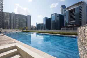 Promo Stylish 1BR City Living at Reva Residences by Deluxe Holiday Homes
