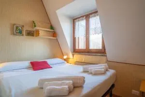 Maggio - appartamento con piscina - Introbio