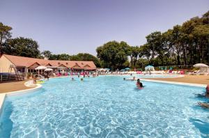 Maisons de vacances HOME-COSY - 6 pers - 40 m2 3 CH - 2 SDB et 2 WC : photos des chambres