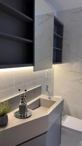 Apartamento para casais próximo à roda gigante com uma vaga de garagem