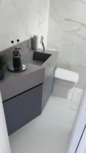 Apartamento para casais próximo à roda gigante com uma vaga de garagem