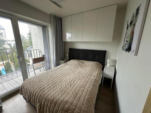 Poilsio apartamentai Malūno vilos