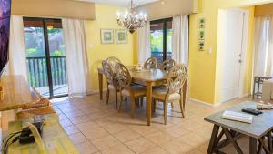 Escape to Paradise - Tranquil 3-Bedroom Retreat with Wrap-Around Lanai and Private Beach