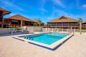 Enjoy pool views from your Sanibel Island Villa Private beach