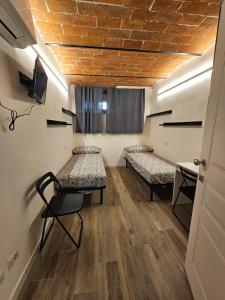 Habitación Doble con baño privado externo - 2 camas