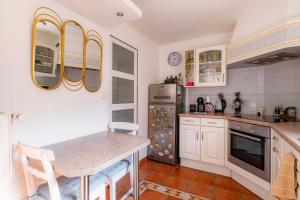 Appartements La Maison de Sam - Logement entier & Terrasse : photos des chambres