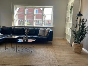 Stor lys lejlighed på 100 kvm, central beliggenhed