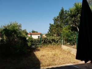 Maisons de vacances Maison accueillante a Calcatoggio avec jardin cloture. : photos des chambres