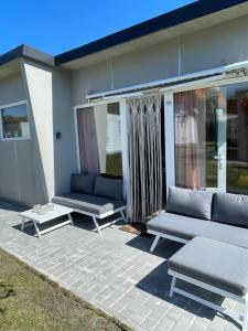 Rustig vakantiehuisje Coester De Haan - 2 slaapkamers