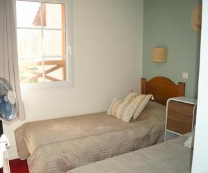 Appartements La residence du Lac - maeva Home - Maison atypique 3 pieces 6 personnes - Prestige - super Home MAE-2884 : photos des chambres