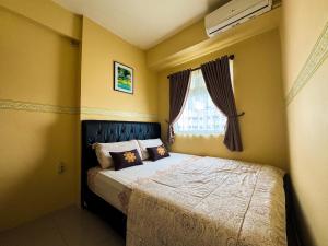 Apt Green Pramuka Tower O With Pool, Wi-Fi & Netflix by Damaresa