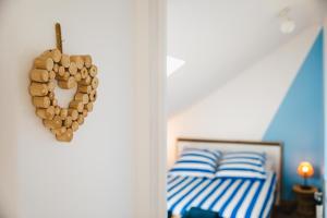 Maisons de vacances L'effet mer Maison renovee lumineuse tout confort belle terrasse grand jardin clos sans vis a vis parking jeux pour enfants 5 mn a pied de la plage d'Asnelles et centre bourg - proche Bayeux au coeur des plages du debarquement : photos des chambres