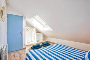 Maisons de vacances L'effet mer Maison renovee lumineuse tout confort belle terrasse grand jardin clos sans vis a vis parking jeux pour enfants 5 mn a pied de la plage d'Asnelles et centre bourg - proche Bayeux au coeur des plages du debarquement : photos des chambres