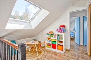 Maisons de vacances L'effet mer Maison renovee lumineuse tout confort belle terrasse grand jardin clos sans vis a vis parking jeux pour enfants 5 mn a pied de la plage d'Asnelles et centre bourg - proche Bayeux au coeur des plages du debarquement : photos des chambres