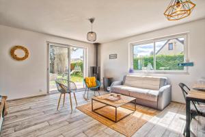 Maisons de vacances L'effet mer Maison renovee lumineuse tout confort belle terrasse grand jardin clos sans vis a vis parking jeux pour enfants 5 mn a pied de la plage d'Asnelles et centre bourg - proche Bayeux au coeur des plages du debarquement : photos des chambres