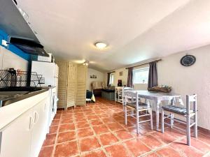 Appartements Cozy studio with private garden : Studio