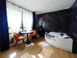 Appartements Suite romantique - Jolies Courbes : photos des chambres