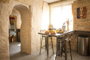 Appartements Chez Millouz - Triplex semi-troglodyte : photos des chambres