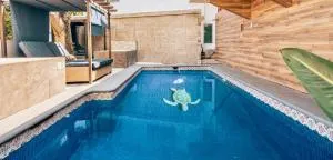 EXCLUSIVO LOFT ALBERCA CLIMATIZADA, 2 JACUZZIS con SISTEMA DE HIDROMASAJE TIPO SPA PARA TU USO EXCLUSIVO, TERRAZA PRIVADA CON ASADOR, Renuévate con el agua de manantial que fluye naturalmente a nuestro alojamiento! - Маліналько