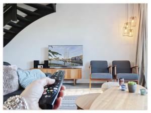 Waterfront Holiday Home with Terrace & Views