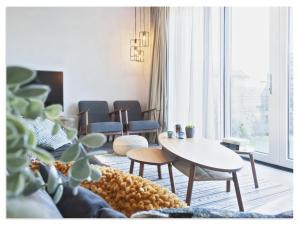 Waterfront Holiday Home with Terrace & Views