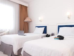 Phòng Hai Giường Đơn Loại Sang (Deluxe Twin Room)